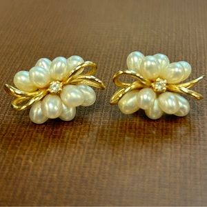 Fresh water pearl earrings with 14k gold and diamond center.